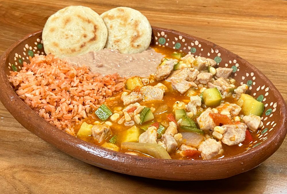 Carne de cerdo con calabaza y elote